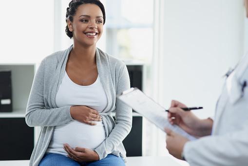 pregnant woman, doctors office