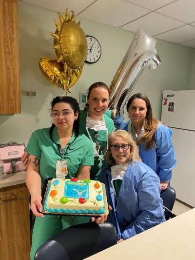 Good Samaritan hospital nurses celebrating with cake