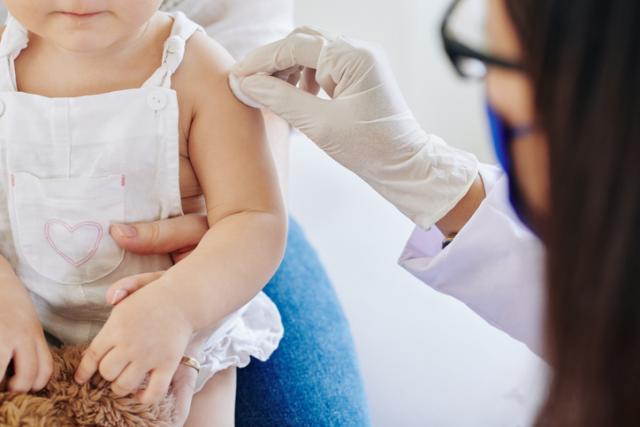 child getting vaccine