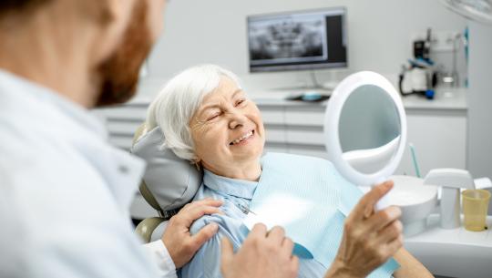 Woman smiling in dentist office
