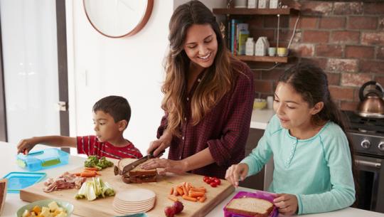 mom and children preparing food
