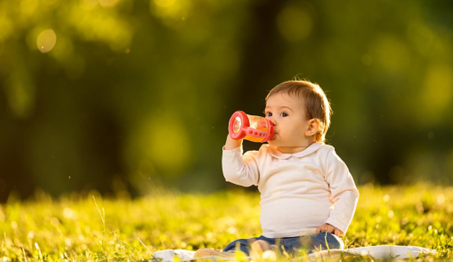 baby drinking fruit juice