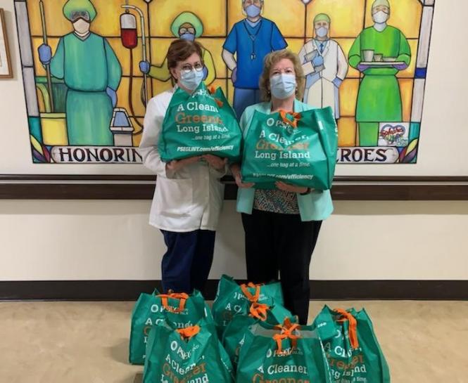 staff with donation bags