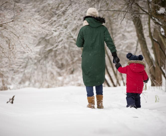 mother child walking in snow