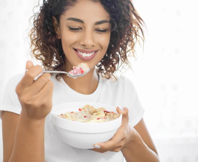 woman eating oatmeal