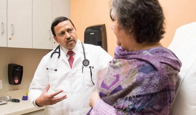 A Cancer Oncology Doctor speaking with a patient