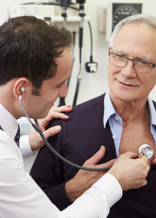 doctor listening to patient's heart