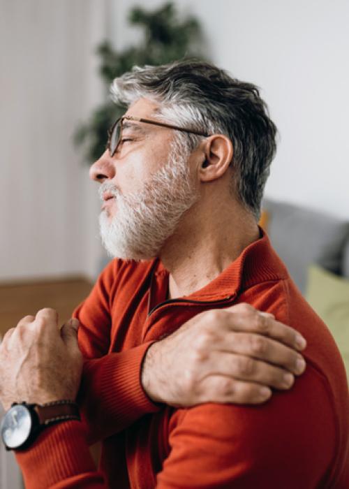 older man with neck pain